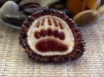 Elk buckle with grizzley bear paw.