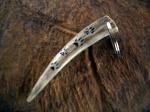 Antler tip keychain with canine tracks